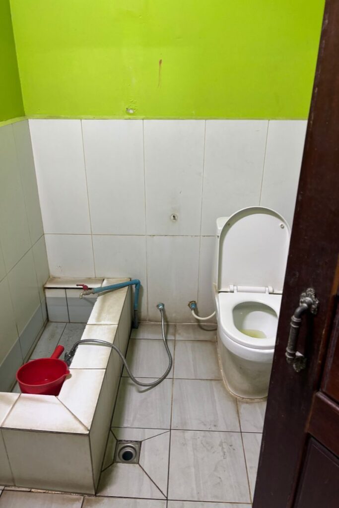 Bathroom stop when taking bus from Saigon to Phnom Penh