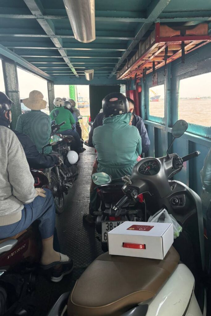 Taking the ferry boat to Can Gio