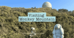 A banner image for a blog titled "Visiting Monkey Mountain," featuring a radar dome on top of Monkey Mountain Da Nang and two stone monkey statues in the foreground against a backdrop of dense greenery.