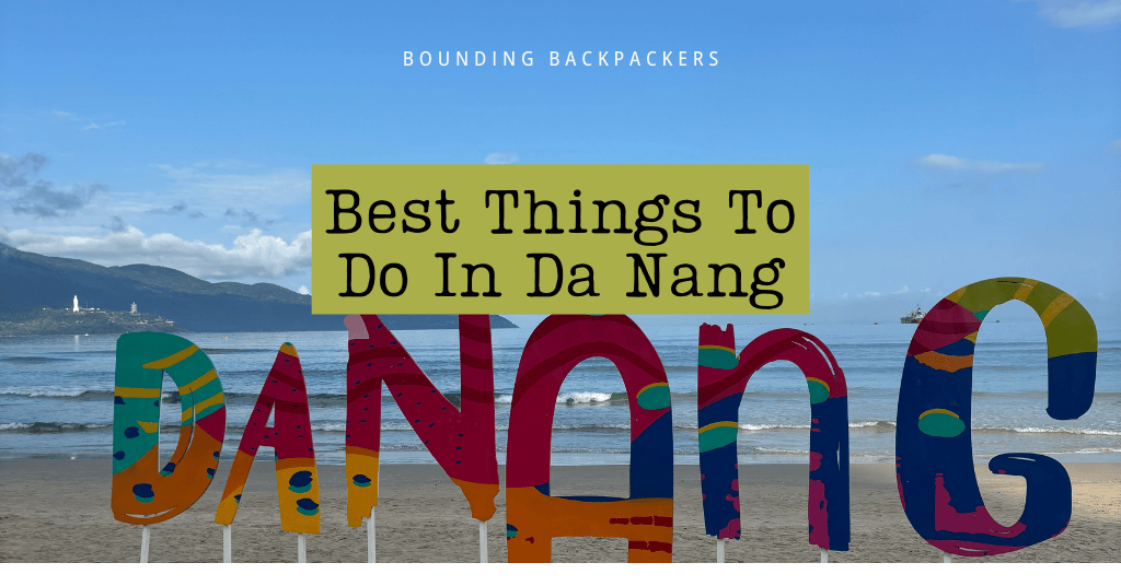 Colorful beachside sign in Da Nang with text overlay reading “Best Things To Do In Da Nang,” representing a travel guide to top activities, sights, and experiences in Da Nang city.