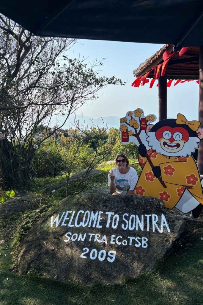 Colorful welcome sign at Son Tra Mountain in Da Nang, also known as Monkey Mountain, marking the entrance to one of the best outdoor Da Nang activities with scenic hikes and wildlife.